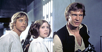 Carrie Fisher in Star Wars with Mark Hamill and Harrison Ford