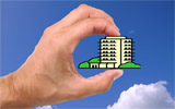 hand holding a cartoon condo
