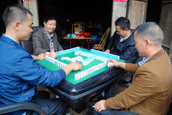 men playing Mahjong