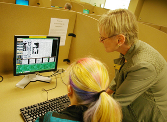 Librarian helping a student