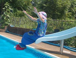 small clown doing a headstand