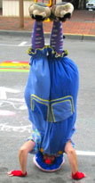 small clown doing a headstand