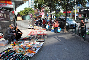 Street jewelry vendor