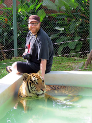 Michael looking on while tiger bathes