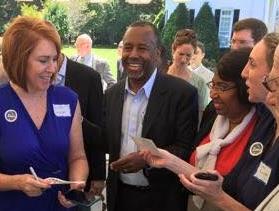 Dr. Ben Carson with Vanita Boulware Sansom (left) and others at a campaign event in Montgomery, AL