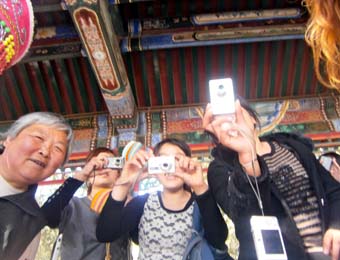 Chinese taking photos of Michael Bush & family