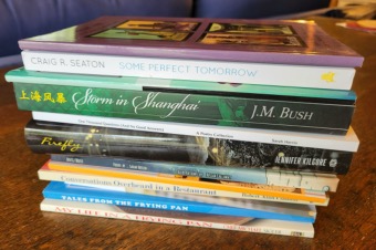 A stack of books by TR authors